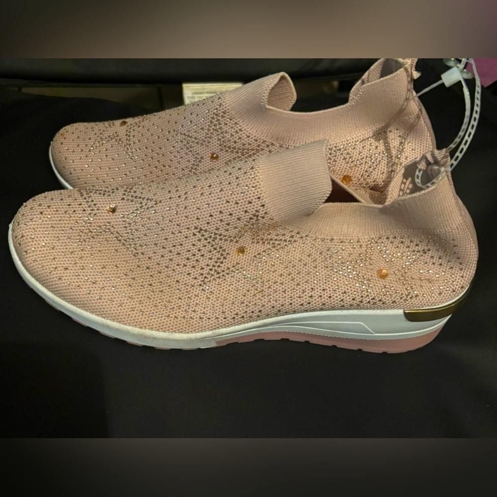 Pink slip on sneakers